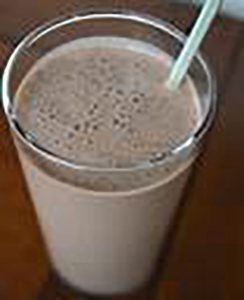 cup with brown liquid inside